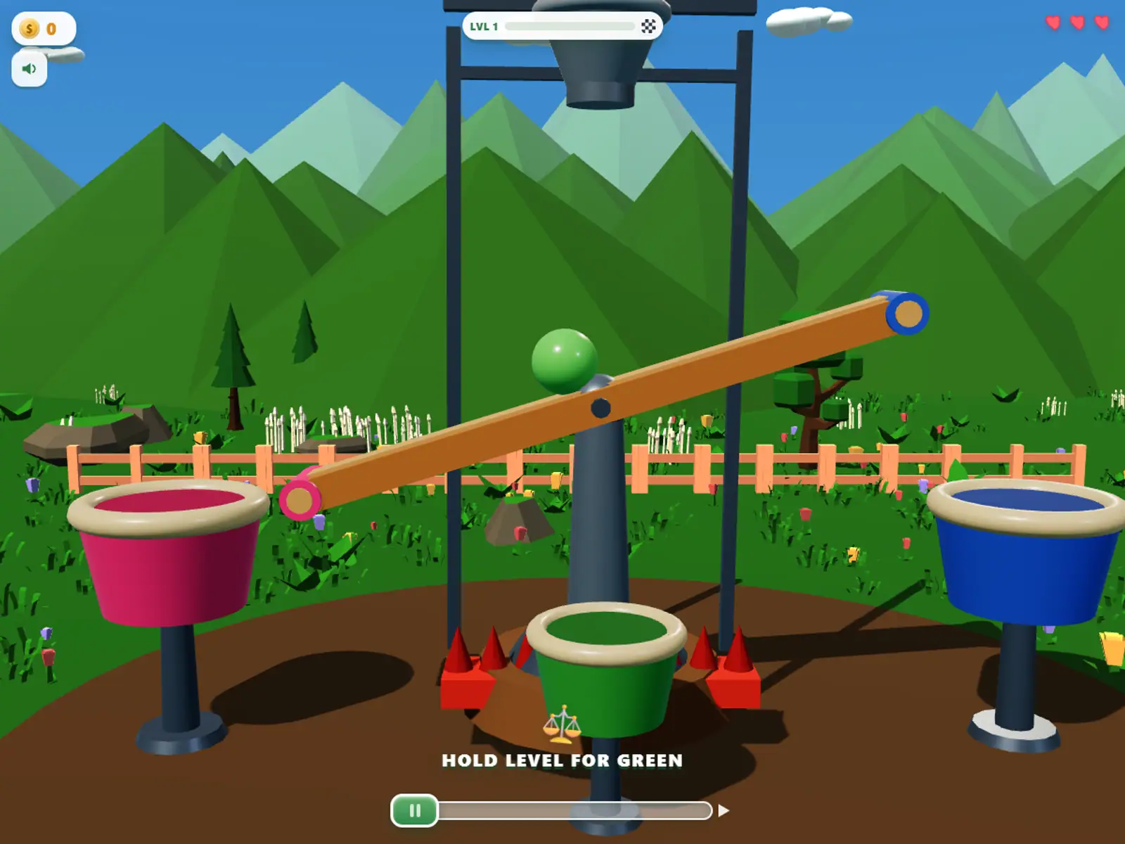 A green ball balanced on a tilting beam above pink, green and blue buckets in a park.